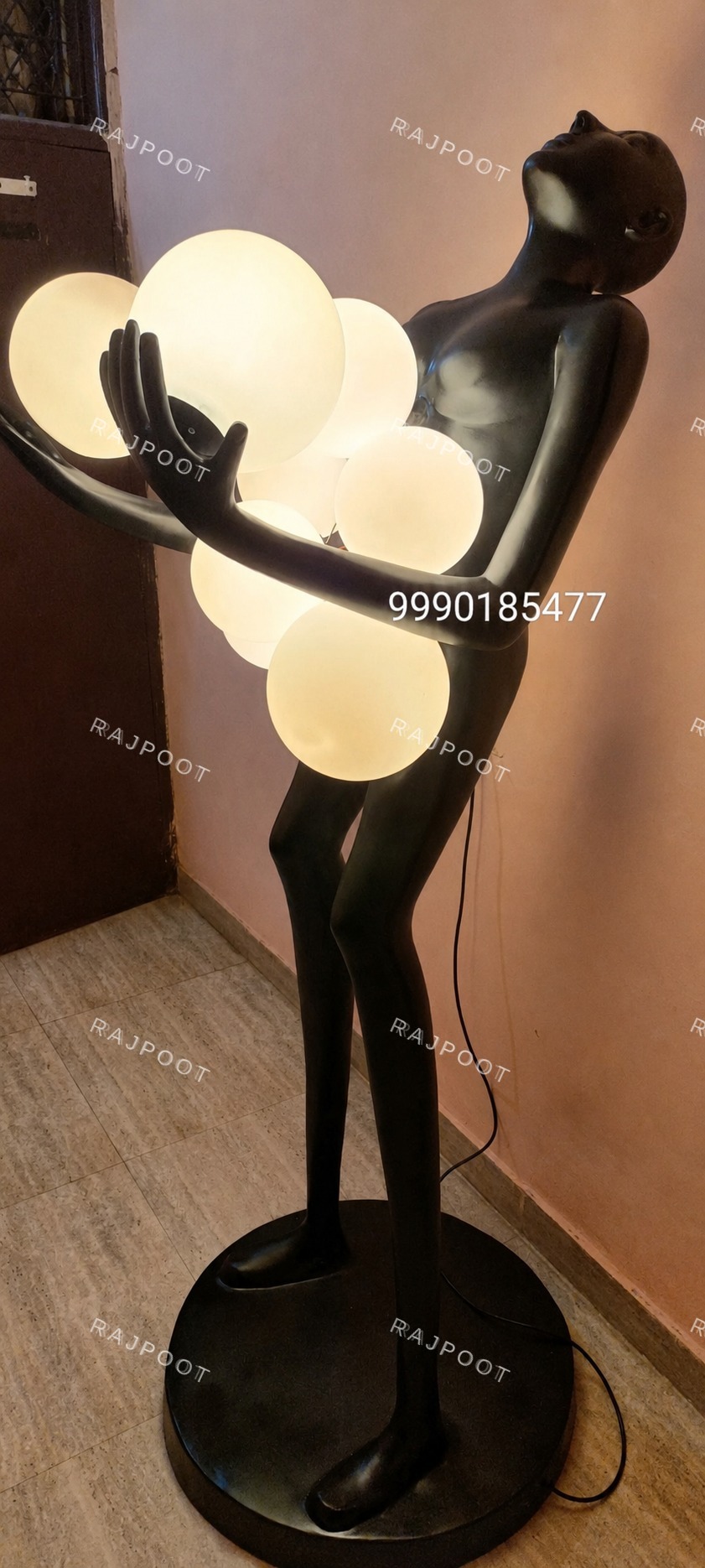 Bent Figure Triple Globe Floor Lamp