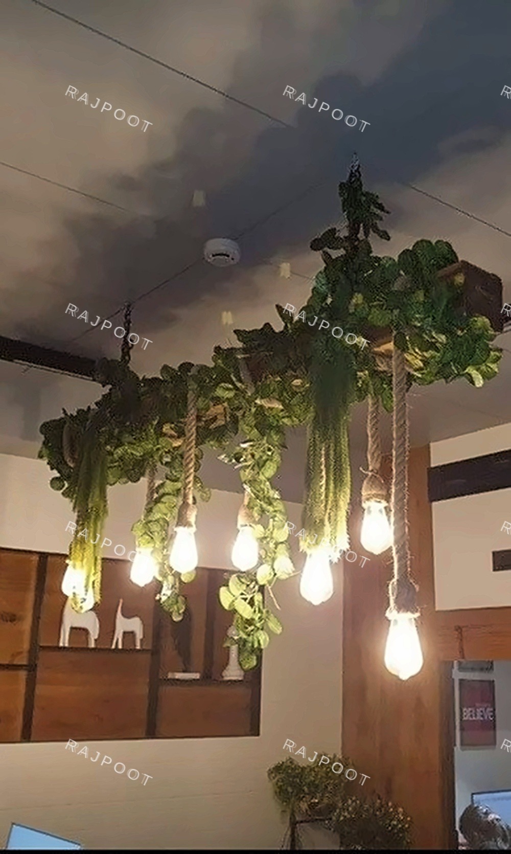 Wood Beam Greenery and Edison Bulb Fixture